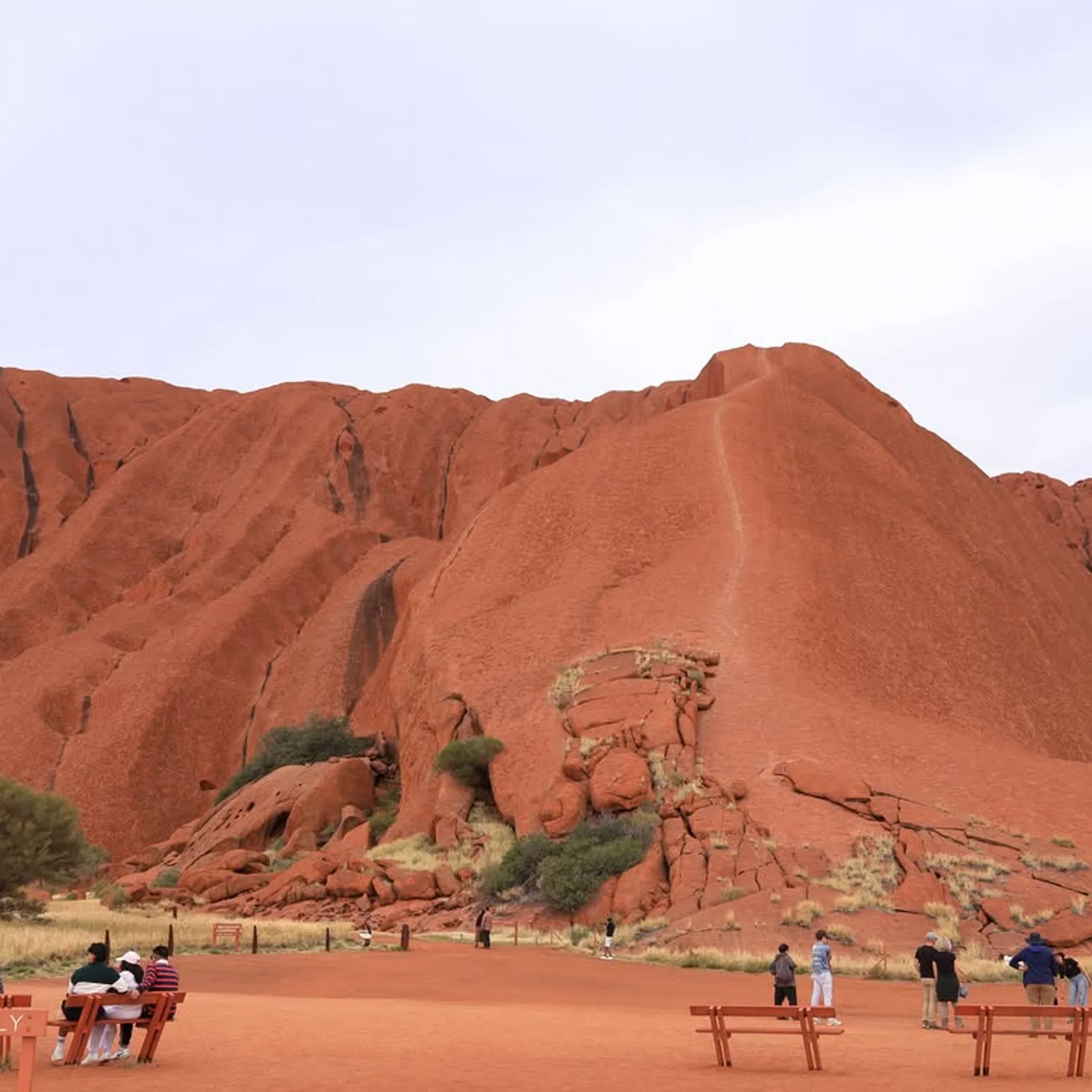 uluru rock formation under clear sky