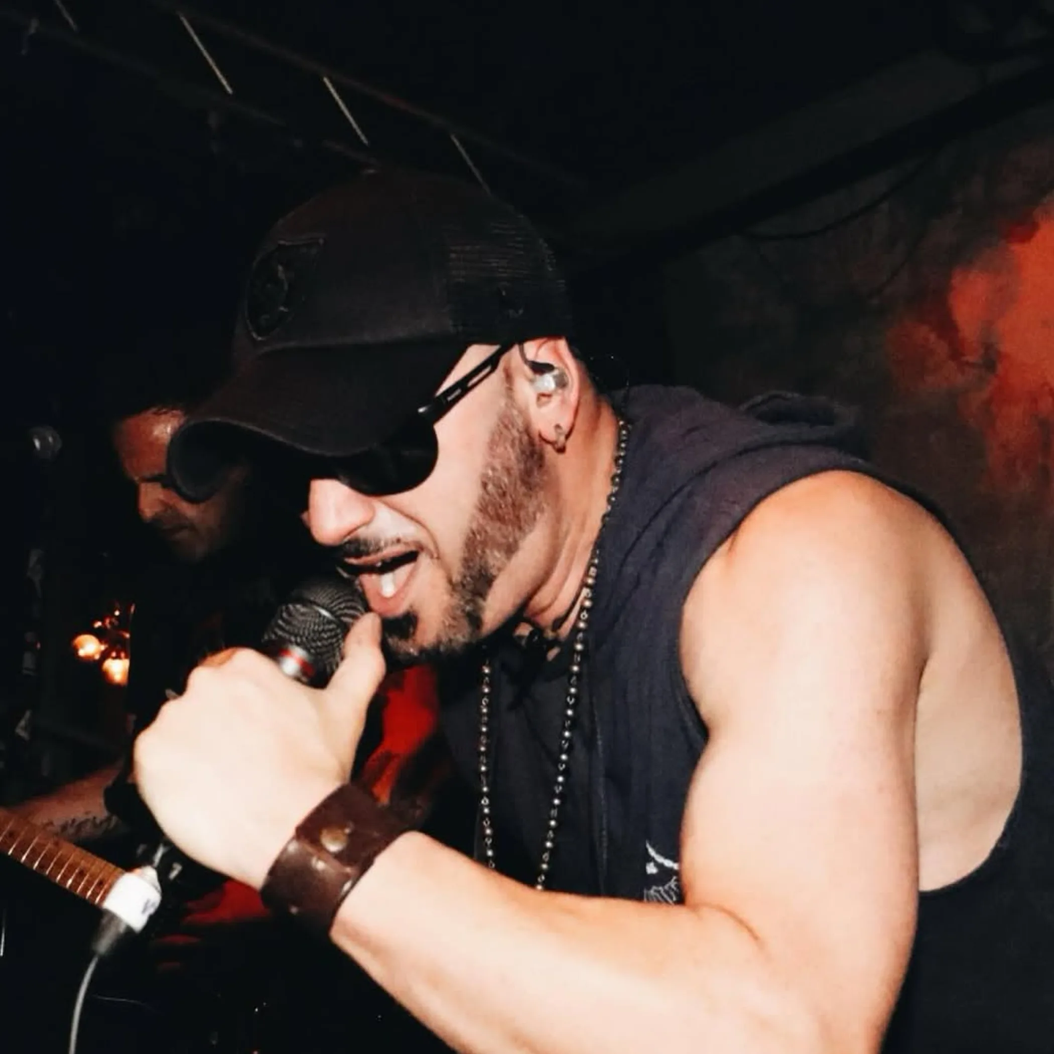 musician performing live on stage