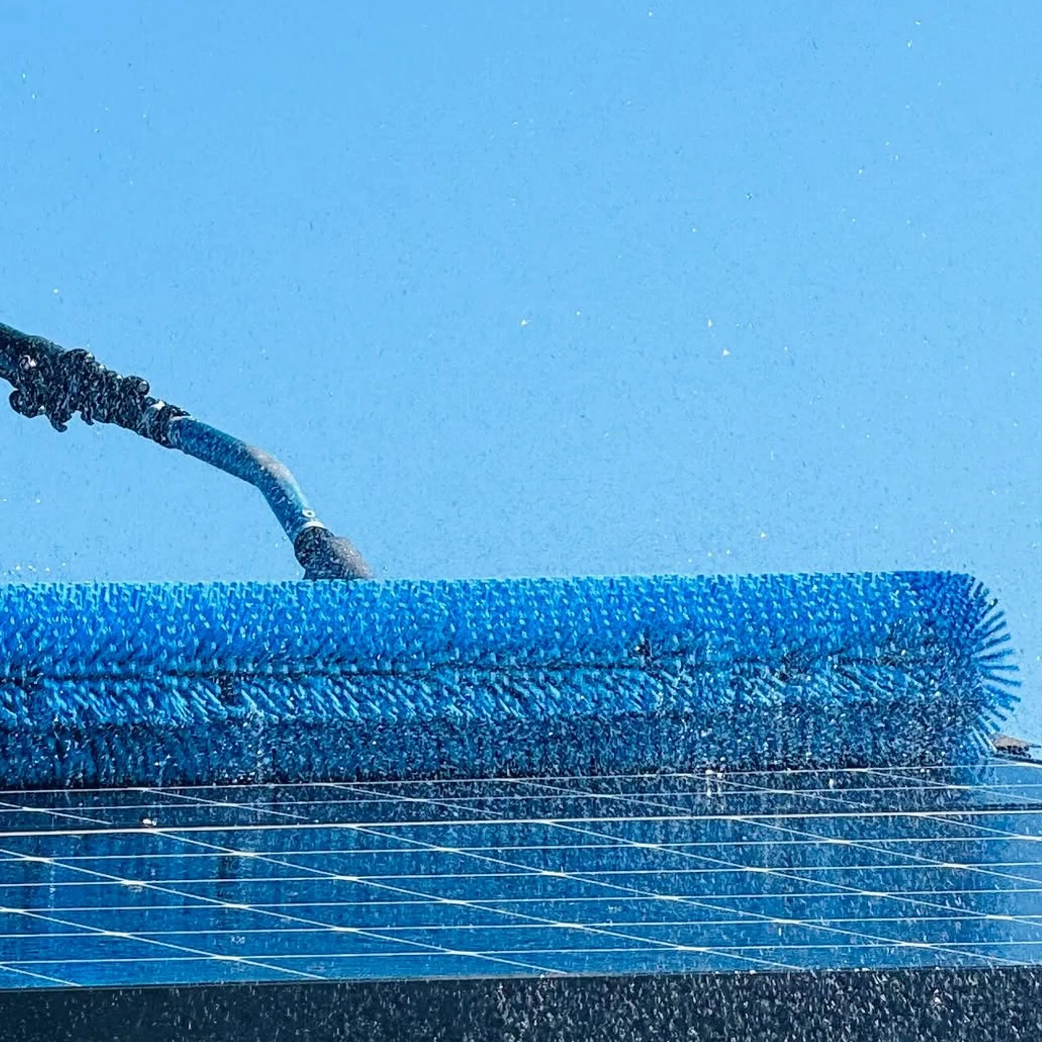 solar panels cleaned with brush